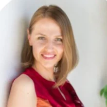 photo of a woman looking at camera - business portrait of a client