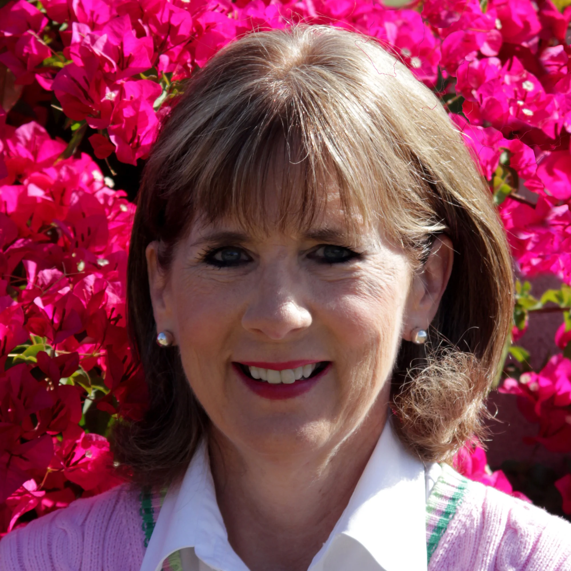 photo of a woman looking at camera - business portrait of a client