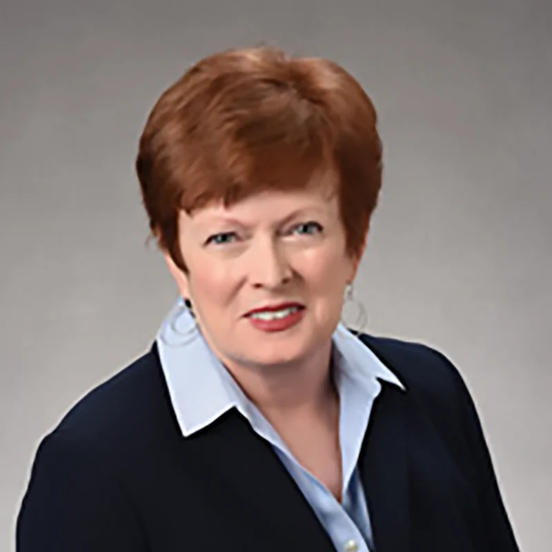 photo of a woman looking at camera - business portrait of a client